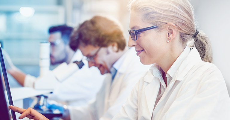 Photo of researchers in lab